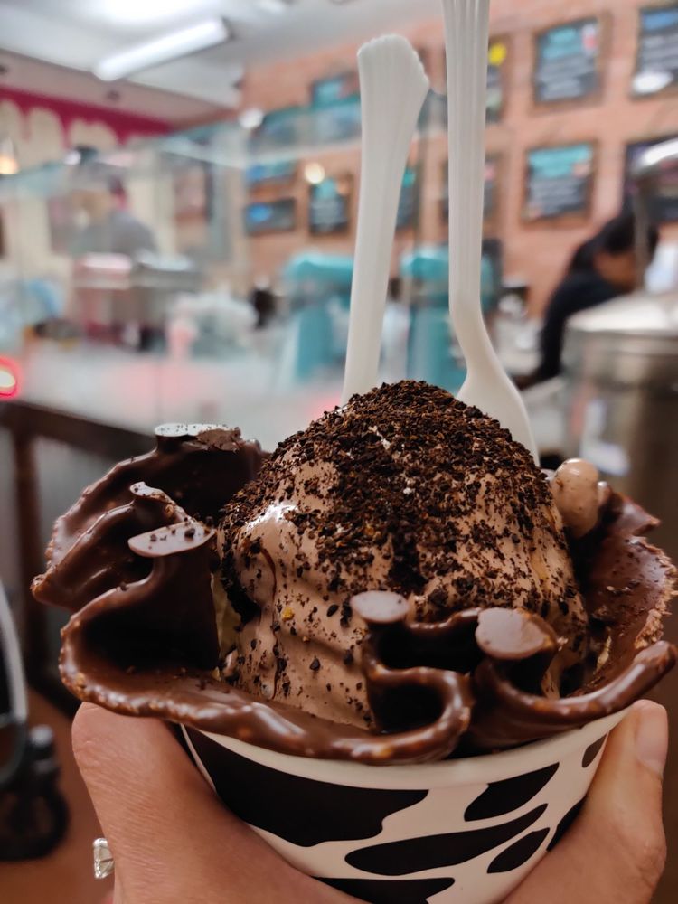 Chocolate waffle bowl with liquid nitrogen ice cream and toppings at NitroInfusions